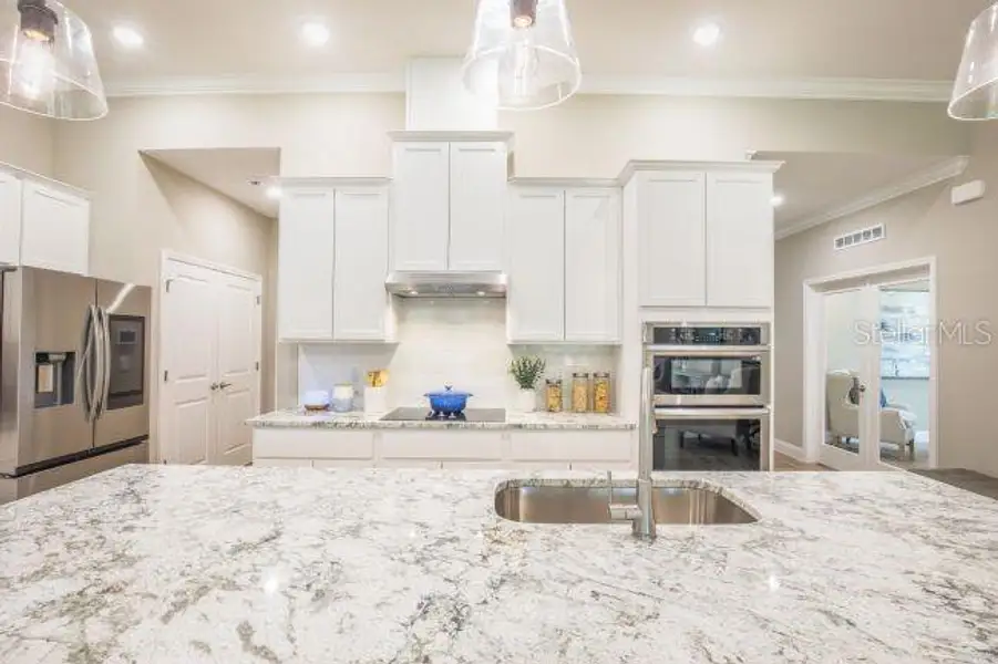 Furnished interior view inside a new home in Royal Highlands, Weeki Wachee (Image 4).
