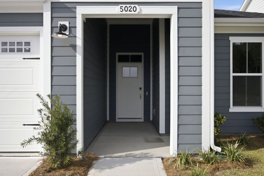 Exterior details and patio area of a home in Terrapin, Leland (Image 3).