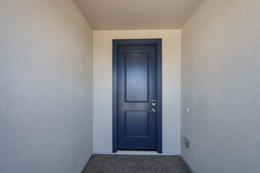 A blue door in a room.