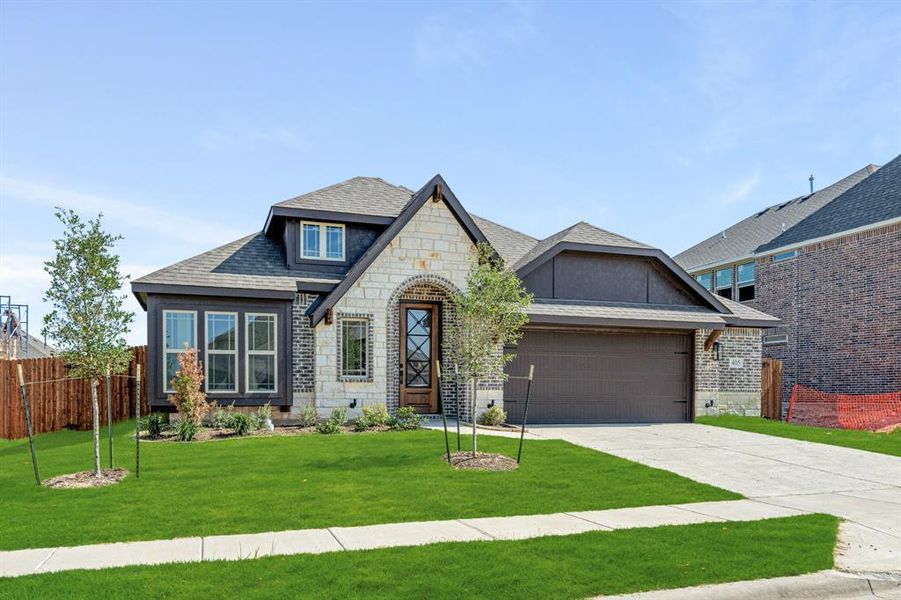 Front exterior of a new home in Maplewood, Glenn Heights, TX, highlighting curb appeal (Image 26). Front exterior of a new home in Maplewood, Glenn Heights, TX, highlighting curb appeal (Image 26).