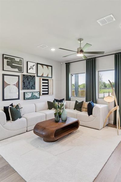 Living Room in the Magnolia home plan by Trophy Signature Homes – REPRESENTATIVE PHOTO