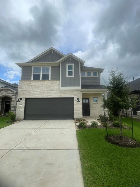 Front exterior of a new home in Ellerden, Tomball, TX, highlighting curb appeal (Image 2). Front exterior of a new home in Ellerden, Tomball, TX, highlighting curb appeal (Image 2).