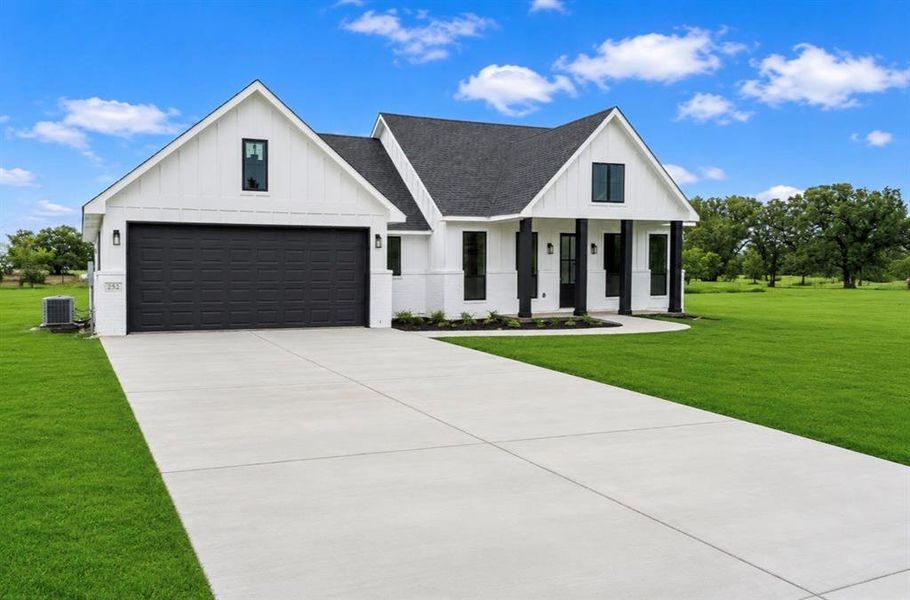 Front exterior of a new home in , Millsap, TX, highlighting curb appeal (Image 17).