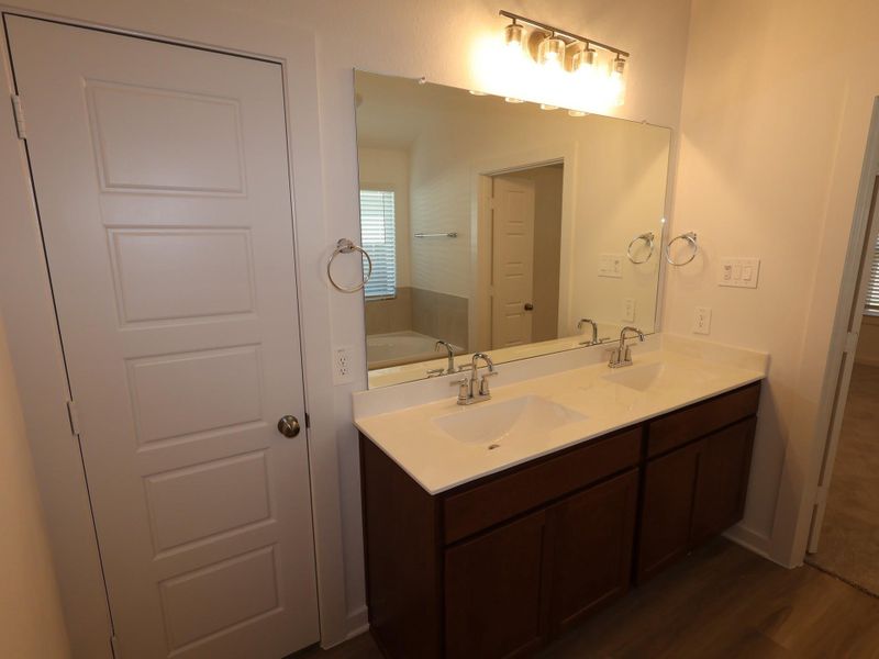 Furnished interior view inside a new home in Pinewood at Grand Texas, New Caney (Image 9).