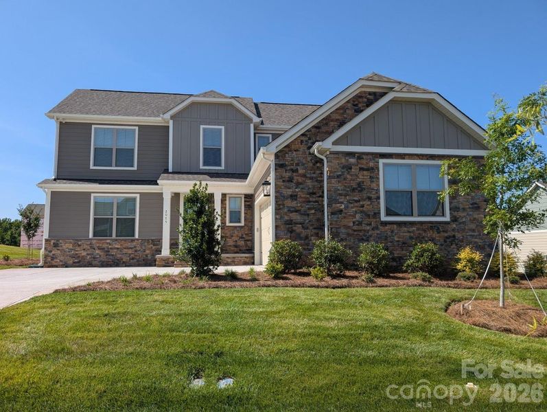 Front exterior of a new home in Stoneridge Hills, Rock Hill, SC, highlighting curb appeal (Image 1). Front exterior of a new home in Stoneridge Hills, Rock Hill, SC, highlighting curb appeal (Image 1).