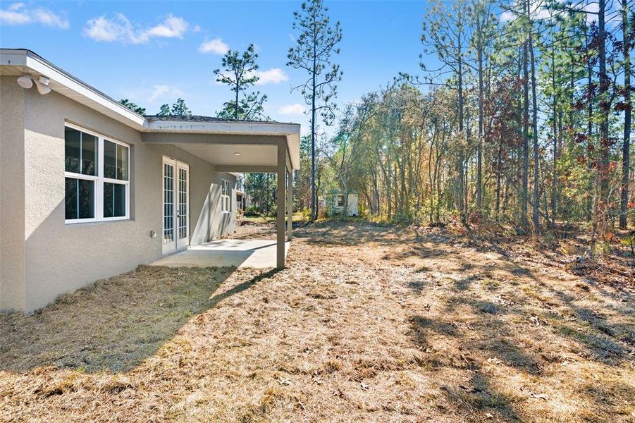 Exterior details and patio area of a home in , Citrus Springs (Image 27).