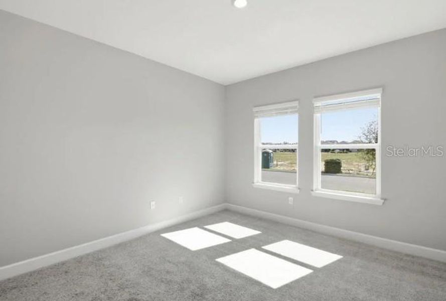 Spacious, unfurnished interior of a new home in Harvest at Ovation, Winter Garden (Image 11).