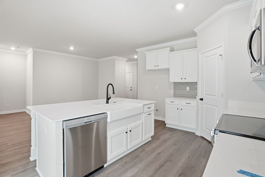Representative furnished interior of a home built from the Magnolia Select M by McGuinn Homes in Broadway Lake, Anderson (Image 7).