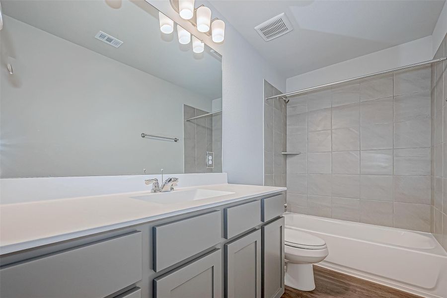 Furnished interior view inside a new home in Mill Creek Trails, Magnolia (Image 12).