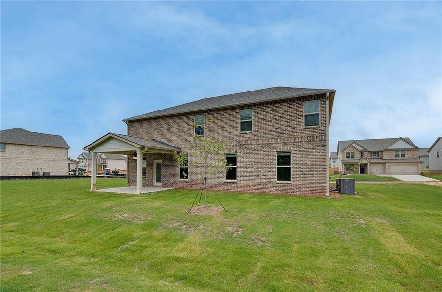 Exterior details and patio area of a home in Kingston, Locust Grove (Image 3).