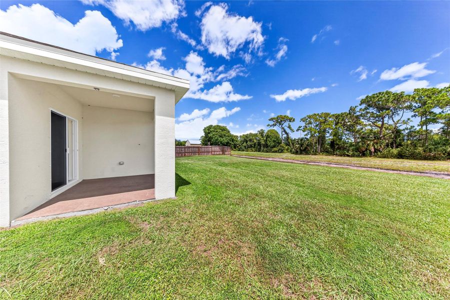 Front exterior of a new home in , Port St. Lucie, FL, highlighting curb appeal (Image 19). Front exterior of a new home in , Port St. Lucie, FL, highlighting curb appeal (Image 19).
