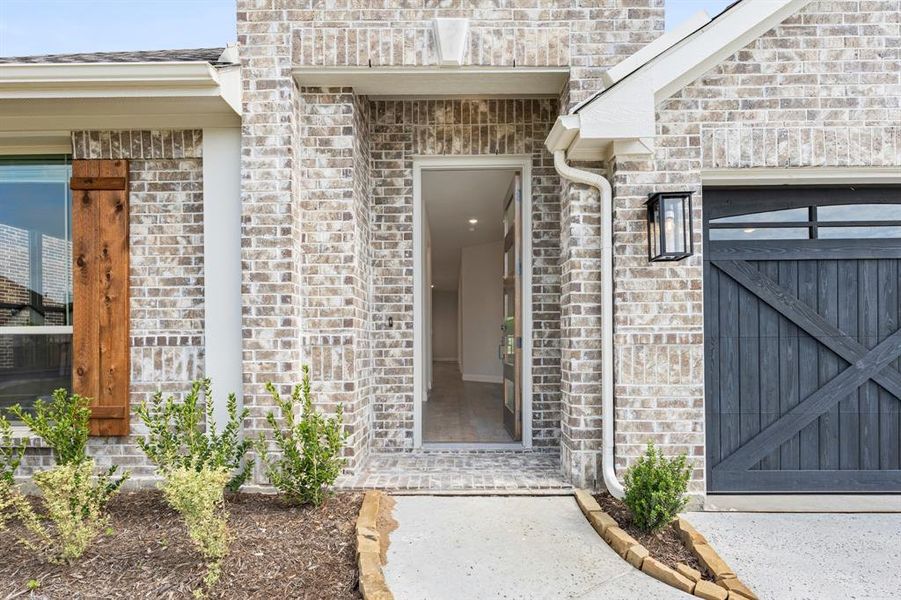 Exterior details and patio area of a home in Parks of Aledo, Aledo (Image 3).