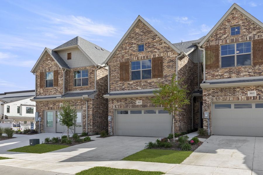 Front exterior of a new home in Wildridge, Oak Point, TX, highlighting curb appeal (Image 20).