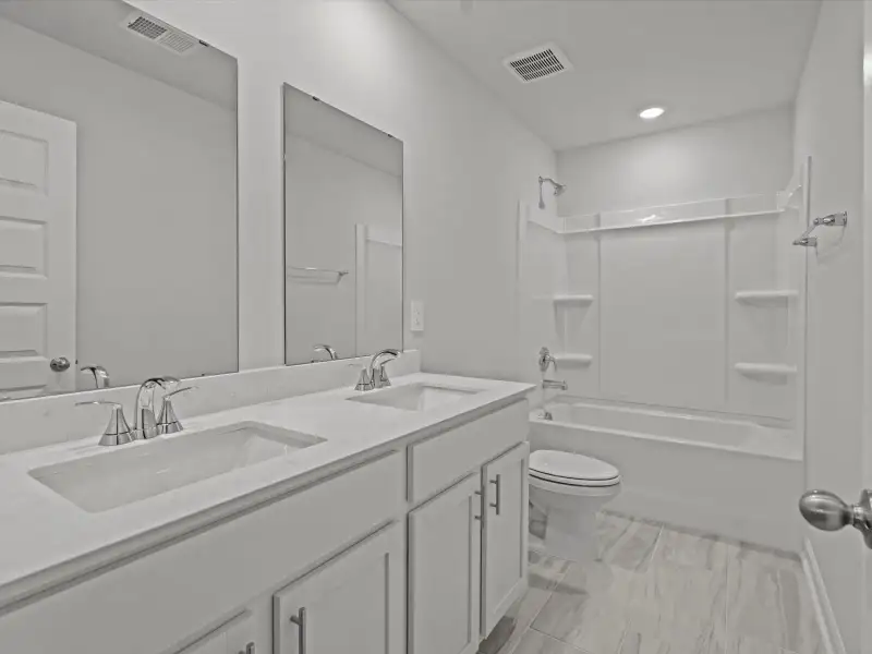 Furnished interior view inside a new home in The Farm at Wells Creek - Heritage Collection, Gray Court (Image 6).