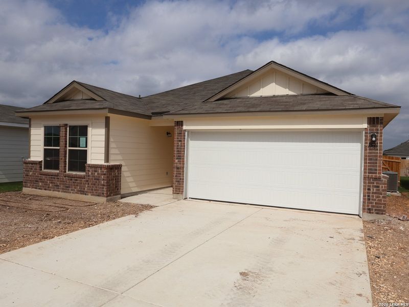 Front exterior of a new home in Meadows at Clear Springs, New Braunfels, TX, highlighting curb appeal (Image 20).