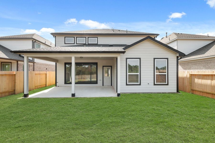 Exterior details and patio area of a home in Barton Creek Ranch, Conroe (Image 3). Exterior details and patio area of a home in Barton Creek Ranch, Conroe (Image 3).
