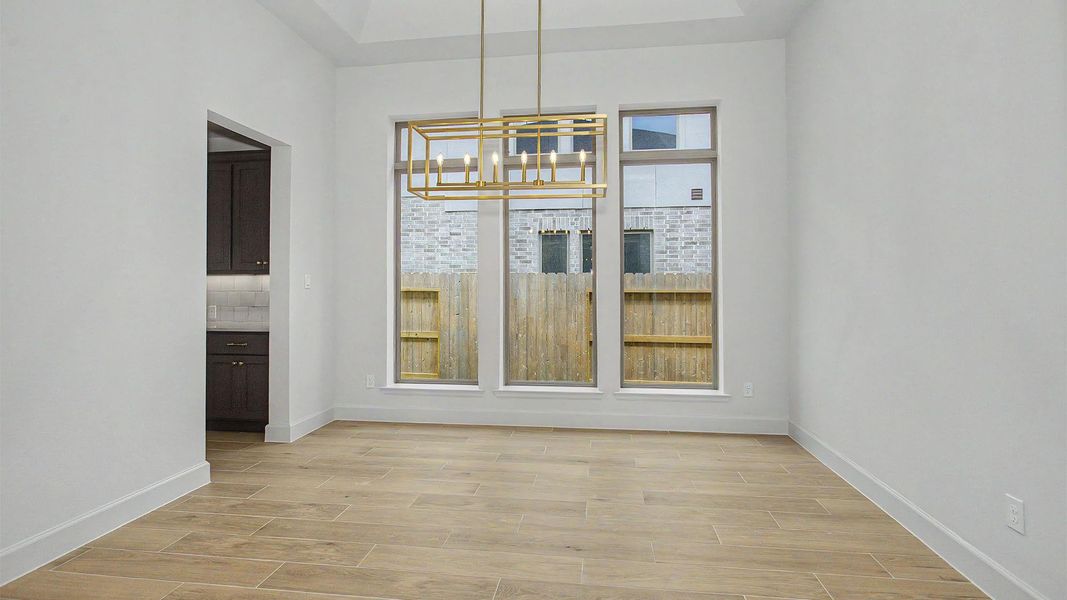 Spacious, unfurnished interior of a new home in Legacy Prairie at Katy Court, Katy (Image 4).
