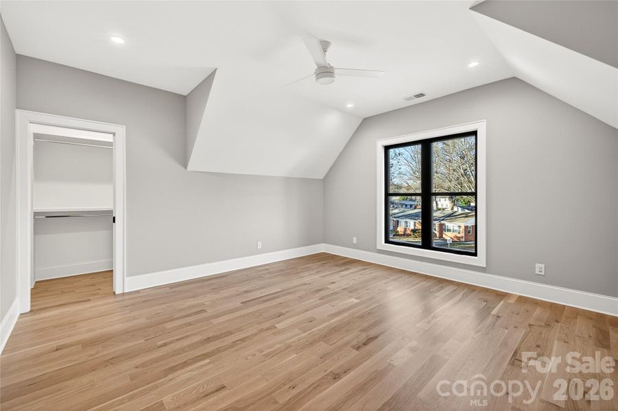 Bedroom #3 on Upper Level, front of house. Straight ahead on the left is the in-suite closet. The in-suite bathroom is on the left wall.