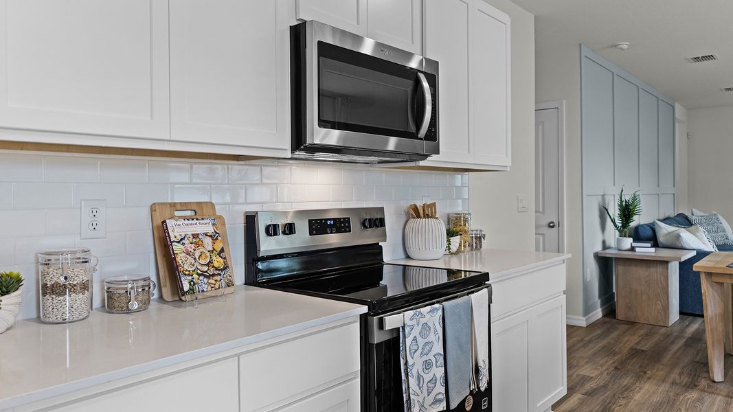 Representative furnished interior of a home built from the HARPER by D.R. Horton in Wynwood, Ocoee (Image 4).
