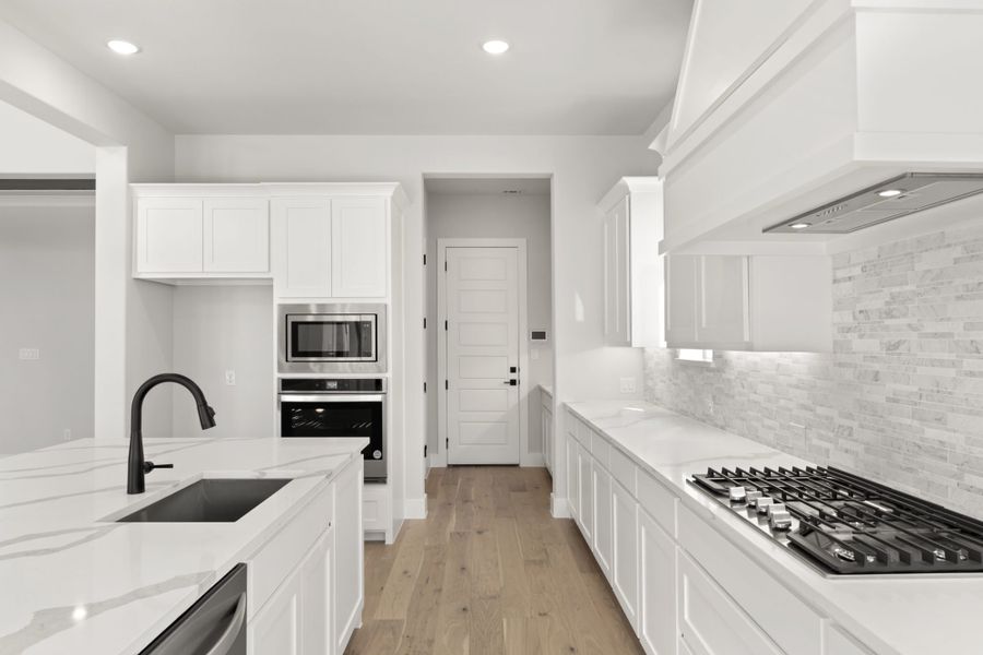 Representative furnished interior of a home built from the 5032 by Tradition Homes in Lakewood at Brookhollow – 60′ Lots, Prosper (Image 6).