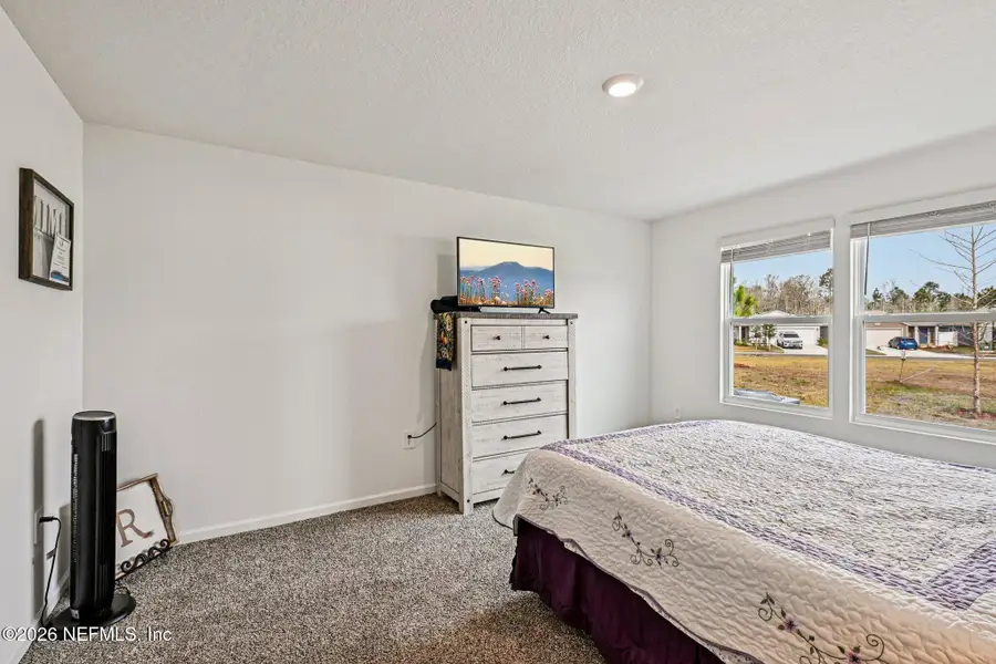 Furnished interior view inside a new home in Cross Creek Express, Green Cove Springs (Image 17).