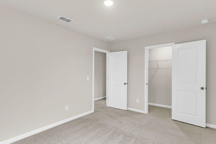 Spacious, unfurnished interior of a new home in Watson Hill, Summerville (Image 15).
