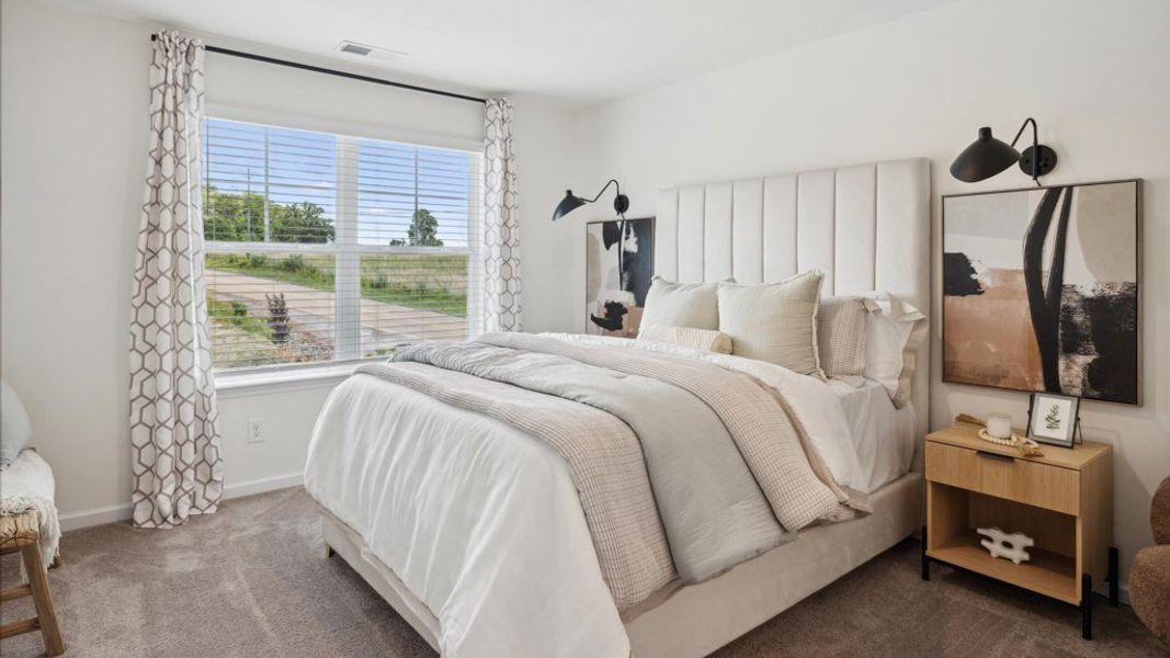 Representative furnished interior of a home built from the Altamont Townhome by D.R. Horton in Saint Marc's, Powell (Image 14).