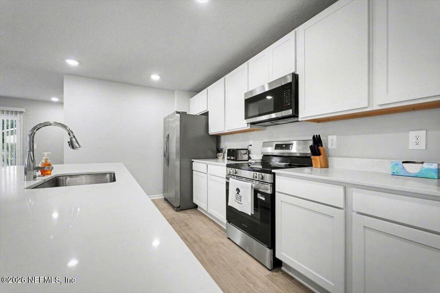 Furnished interior view inside a new home in Kings Landing, Jacksonville (Image 29).