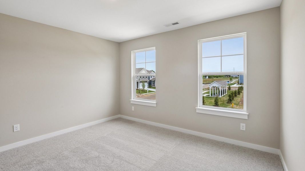 Secondary Bedroom with two windows Secondary Bedroom with two windows