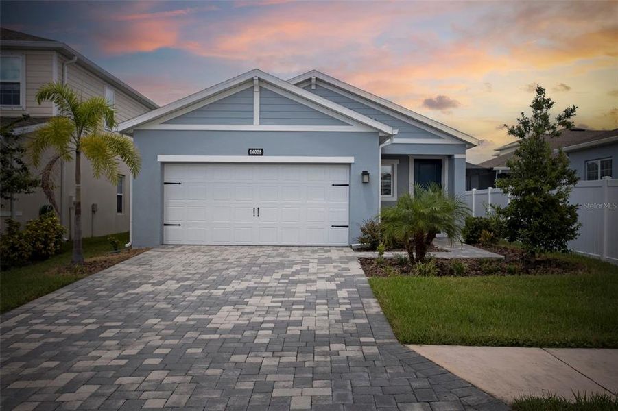Front exterior of a new home in , Bradenton, FL, highlighting curb appeal (Image 20).