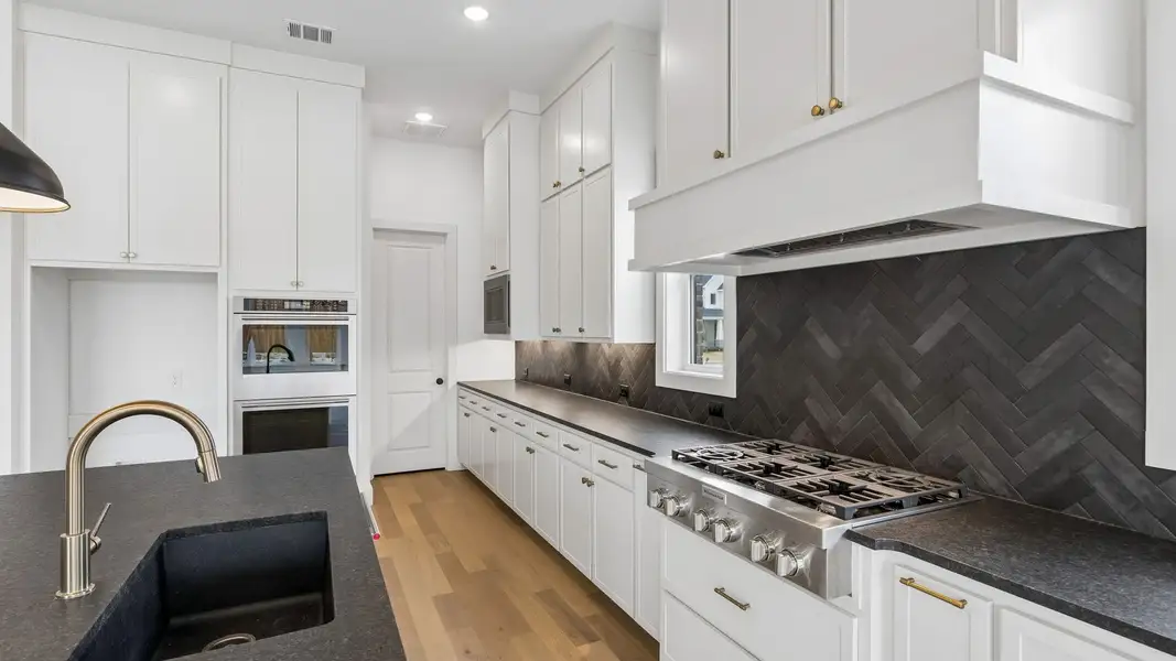 Representative furnished interior of a home built from the Colton by Southgate Homes in The Reserve at Watters, Allen (Image 7).