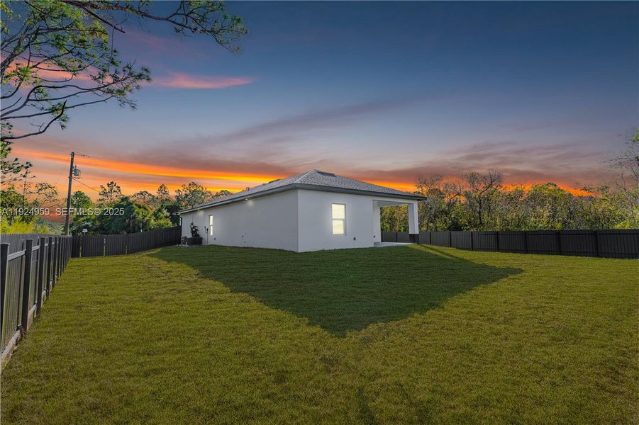 Exterior details and patio area of a home in , Lehigh Acres (Image 4).
