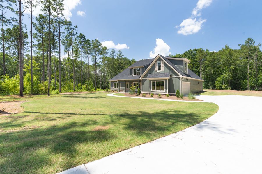 Front exterior of a new home in Stewart Estates, Meansville, GA, highlighting curb appeal (Image 25).