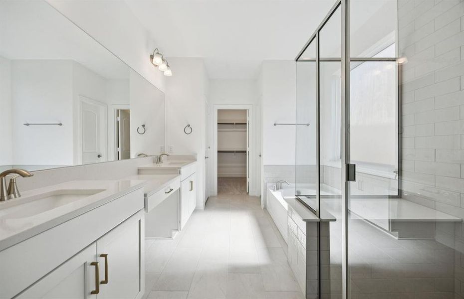 Owner's bath features double vanity and large shower Owner's bath features double vanity and large shower