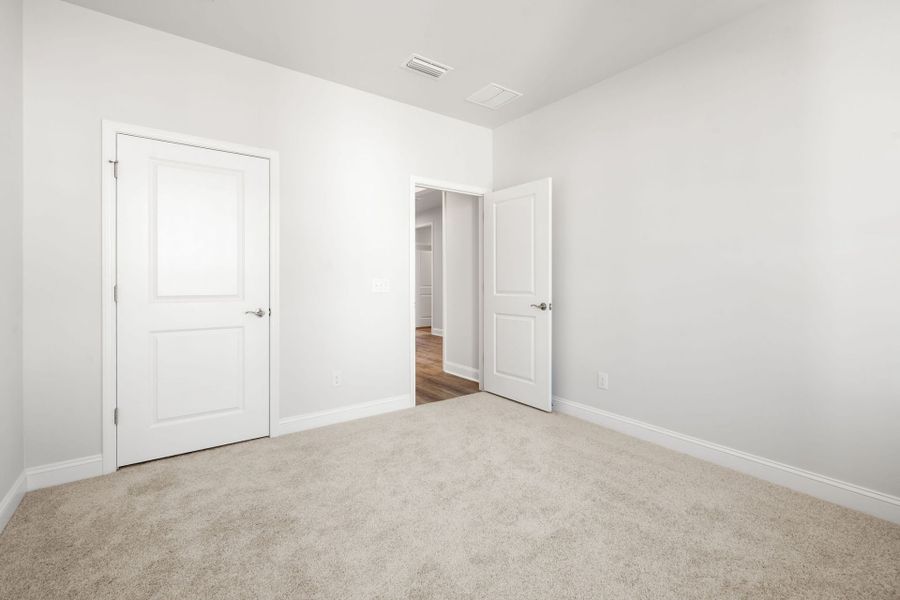 Spacious, unfurnished interior of a new home in Midpoint at New Riverside, Bluffton (Image 21).