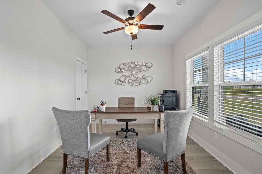 Representative furnished interior of a home built from the Brantley II by Great Southern Homes in Collins Cove, Chapin (Image 7).