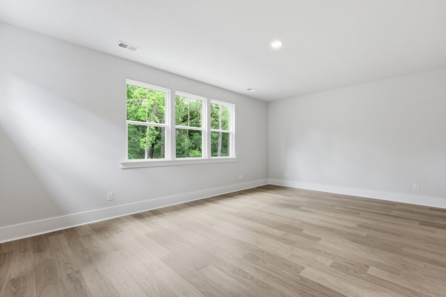 Spacious, unfurnished interior of a new home in Indigo Grove Single Family Homes, Johns Island (Image 19).
