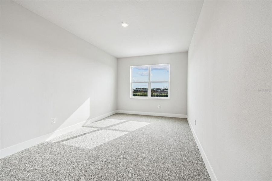 Spacious, unfurnished interior of a new home in Waterset Tradition Series, Apollo Beach (Image 40).