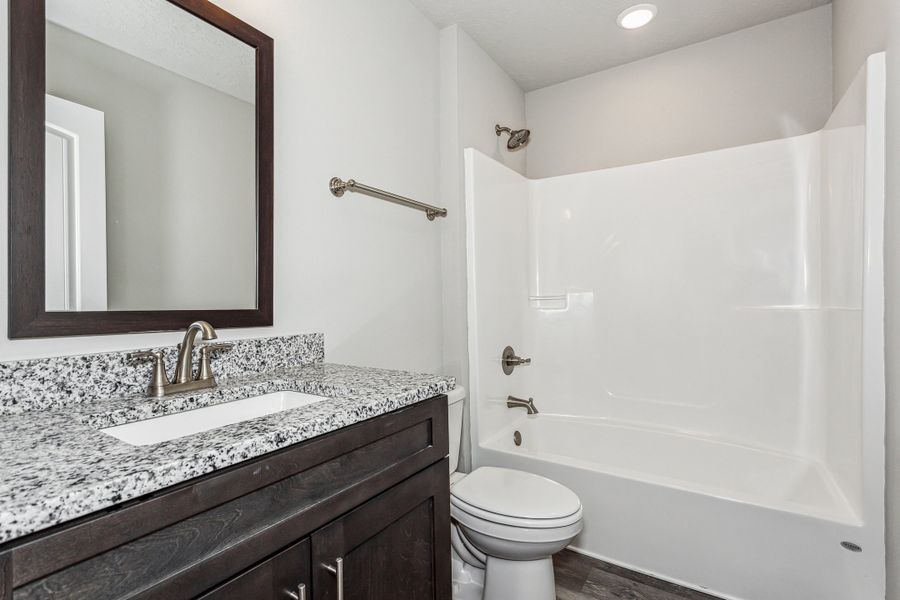 Representative furnished interior of a home built from the The Sapphire by Herbst Homes in Clear Water Landing, Milton (Image 62).