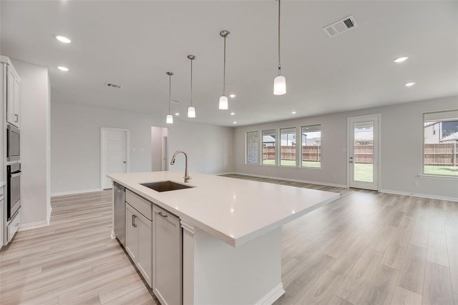 Furnished interior view inside a new home in Valencia On The Lake, Little Elm (Image 9).