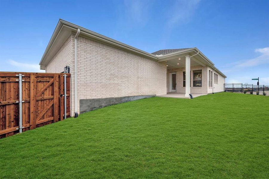 Exterior details and patio area of a home in Talia – Garden Series, Mesquite (Image 4).