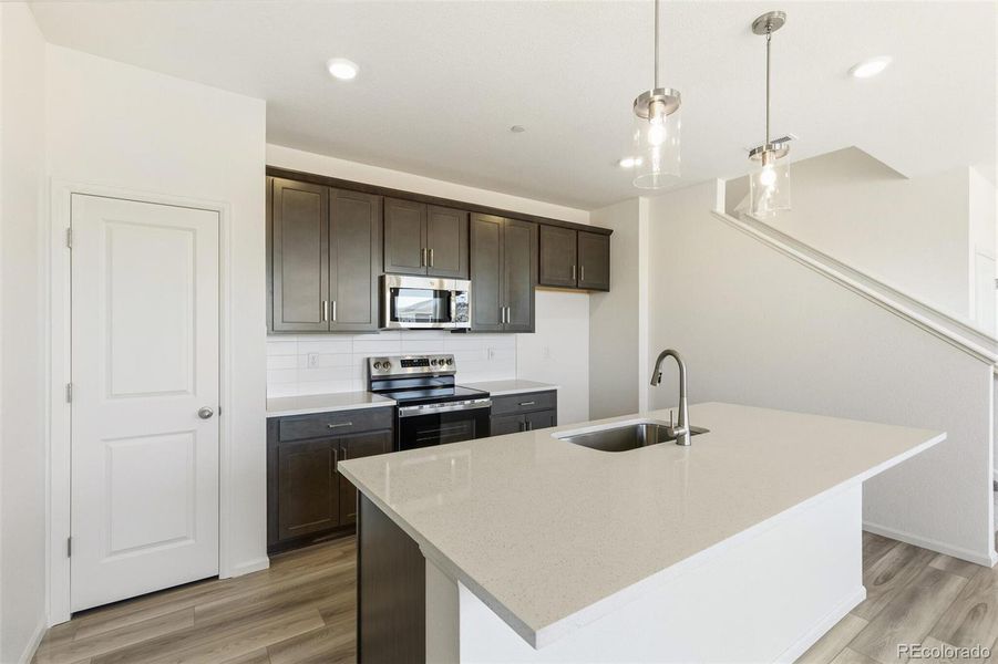 Furnished interior view inside a new home in Turnberry, Commerce City (Image 7).