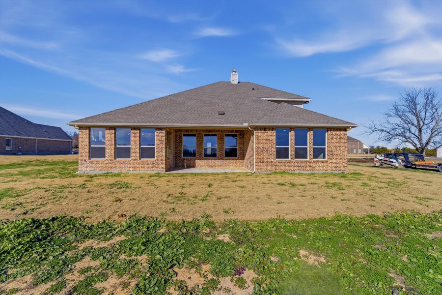 Exterior details and patio area of a home in Fannin Ranch, Leonard (Image 20).