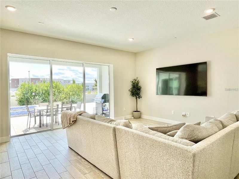 Furnished interior view inside a new home in Parkview Reserve, Orlando (Image 51).