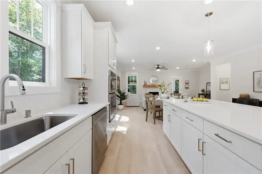 An open floorplan seamlessly connects the well-app