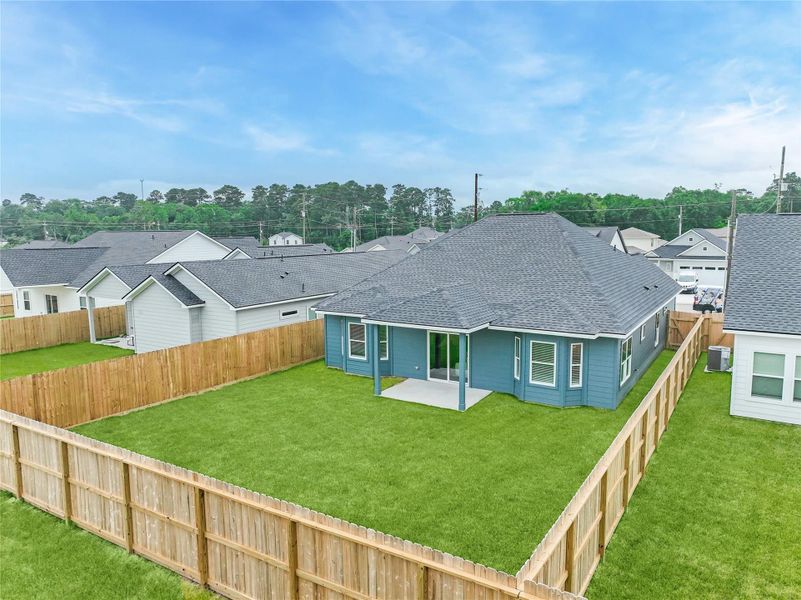Exterior details and patio area of a home in , Splendora (Image 25).