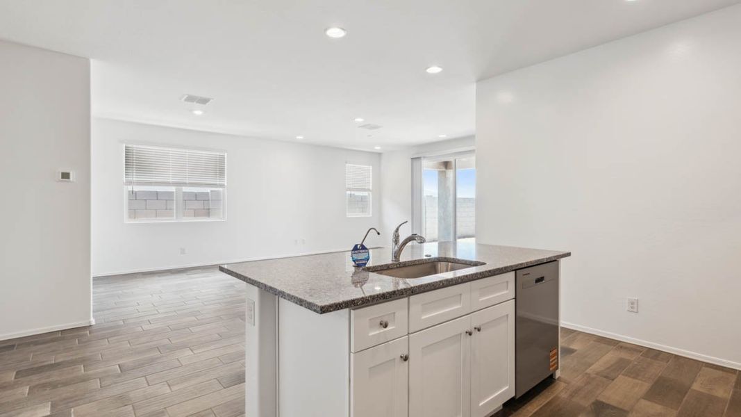 Representative furnished interior of a home built from the Puffin by D.R. Horton in Moonlight, Maricopa (Image 8).