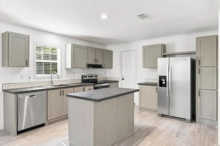 Furnished interior view inside a new home in , Zephyrhills (Image 4).