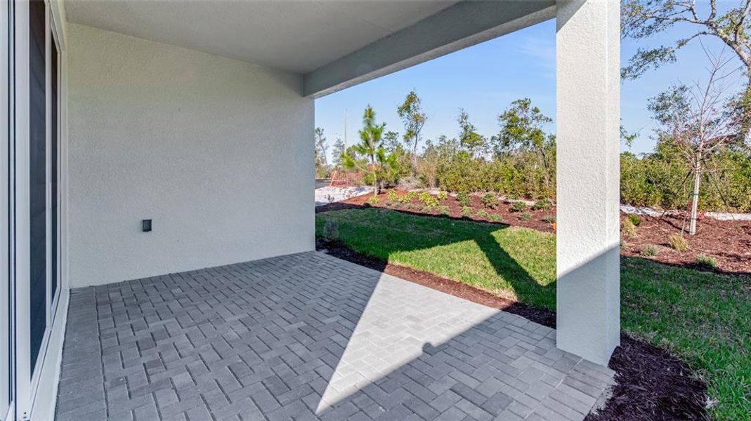 Exterior details and patio area of a home in Cresswind DeLand, Deland (Image 14).