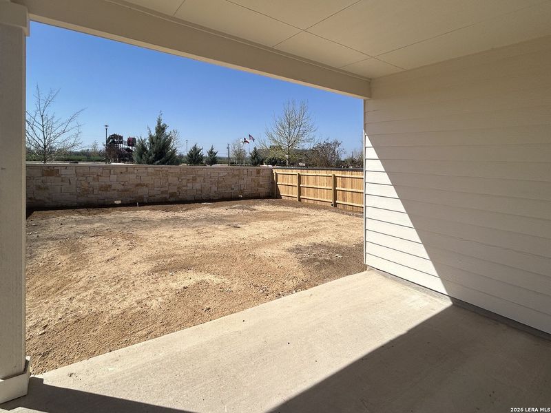 Exterior details and patio area of a home in Hennersby Hollow, San Antonio (Image 4).